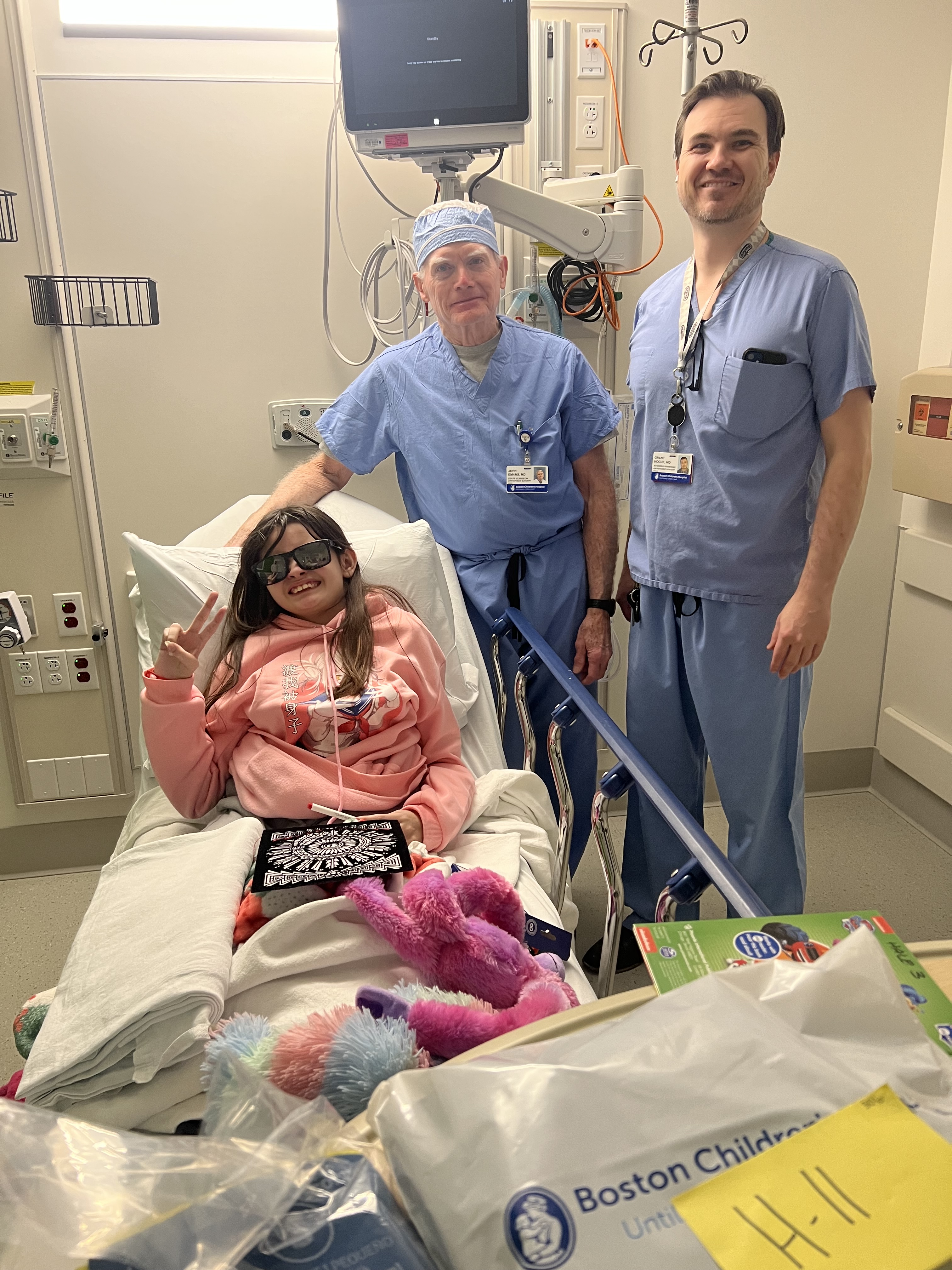 Tenleigh, Dr. Emans, and Dr. Hogue before Tenleigh’s 33rd surgery.
